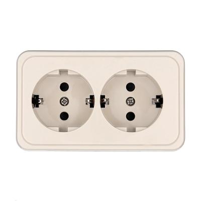 Розетка двойная открытой установки с заземляющими контактами с защитными шторками LK Studio Standard 813501