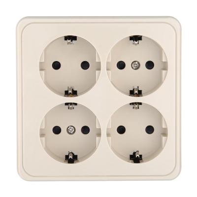 Розетка четырехместная открытой установки с заземляющими контактами и защитными шторками LK Studio Standard 813801