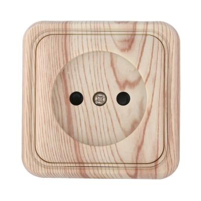 Розетка открытой установки без заземляющих контактов с защитными шторками LK Studio Standard 813325